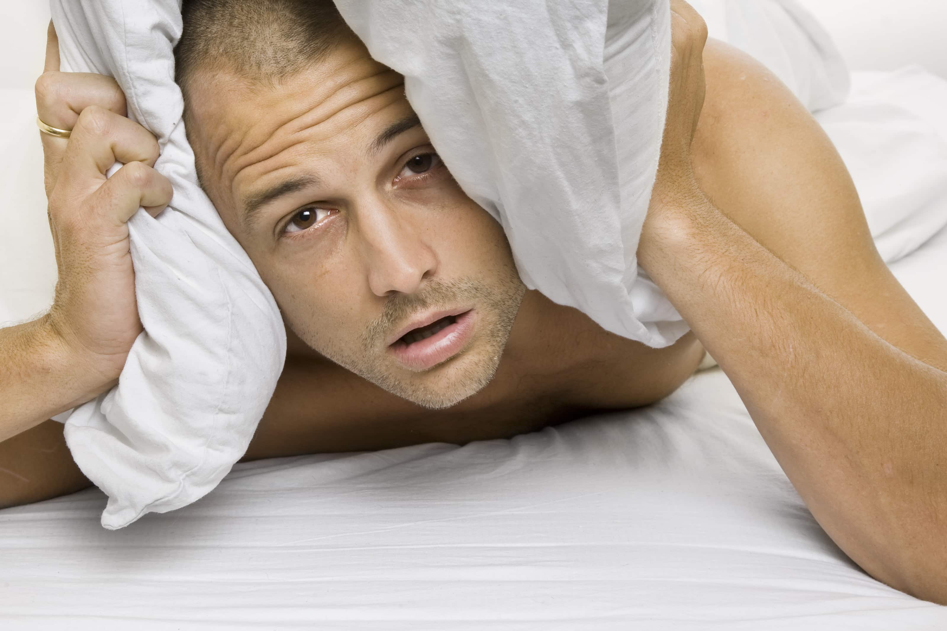 Man Trying to Sleep