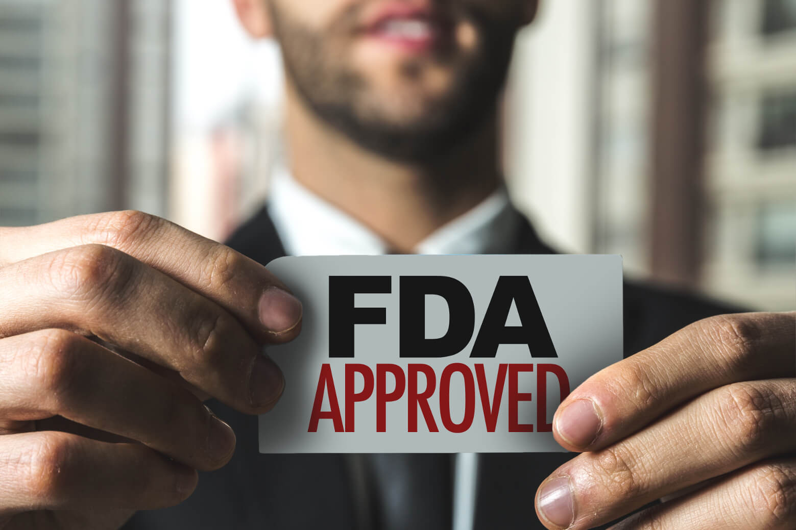 man-with-fda-sign