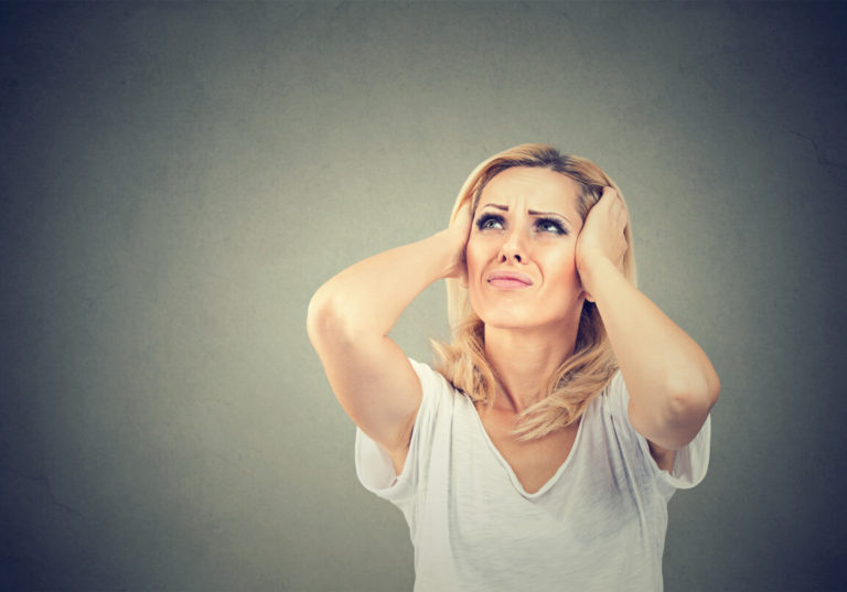 woman-covering-ears