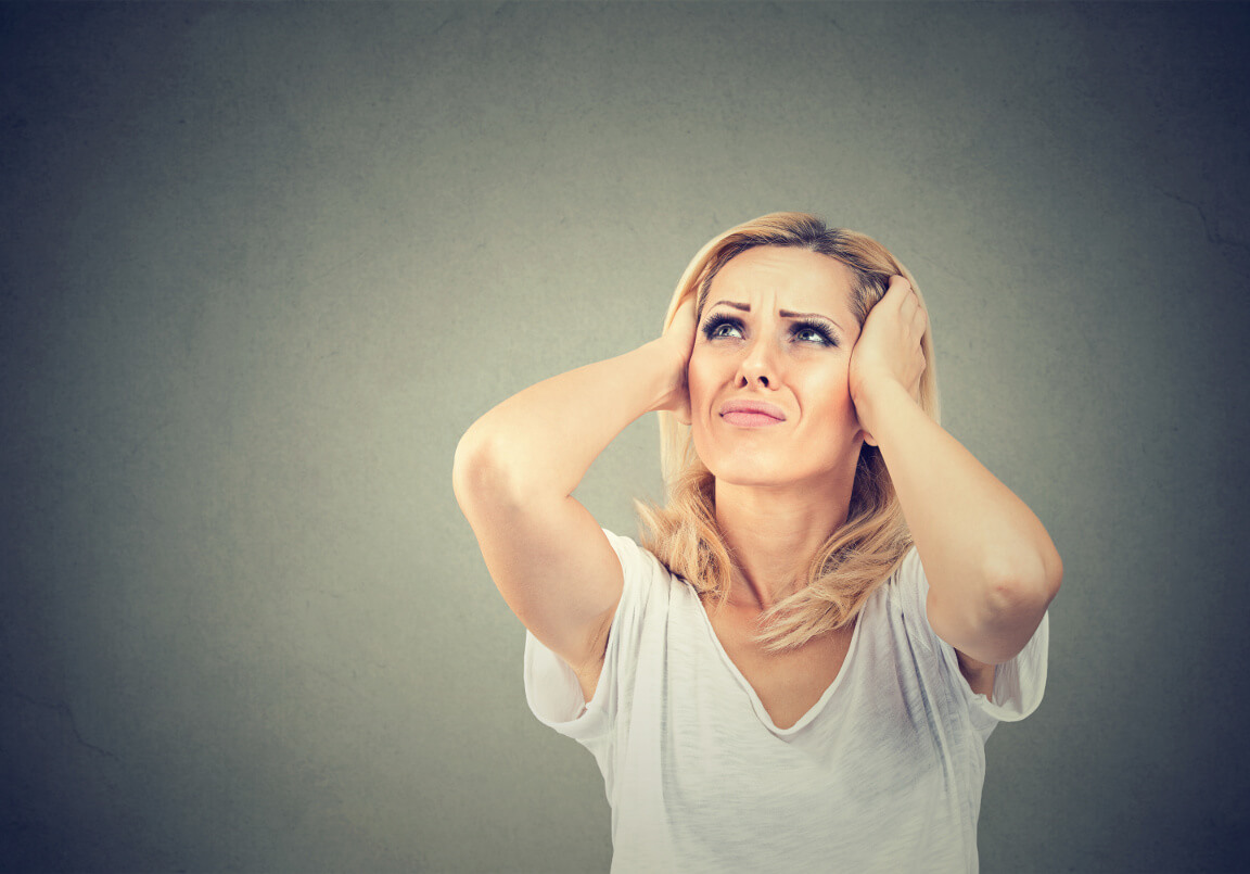 woman-covering-ears
