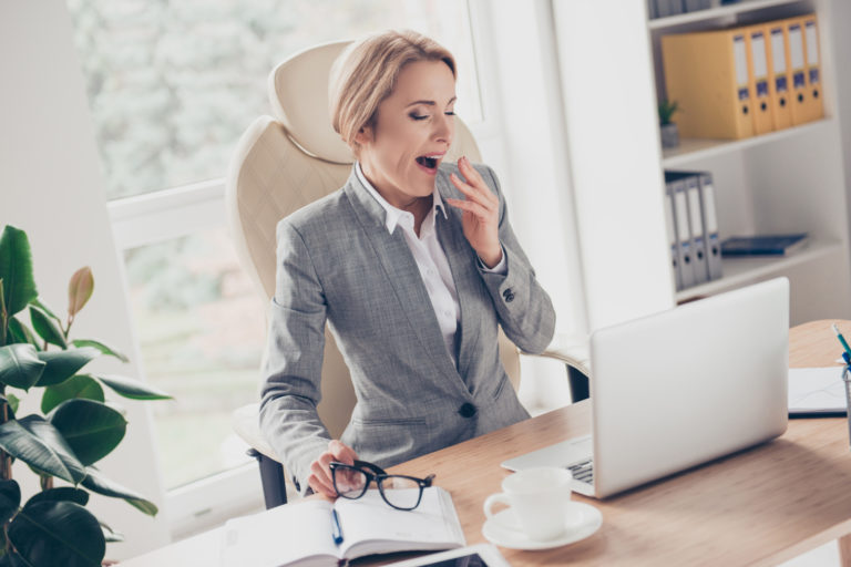 lady-at-desk-yawning
